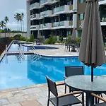Flat Mana Beach Muro Alto