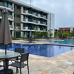 Flat Mana Beach Muro Alto